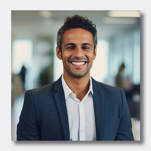 smiling man in blue blazer